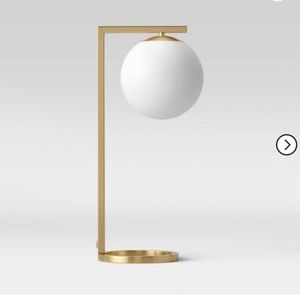 Gold framed globe lamp